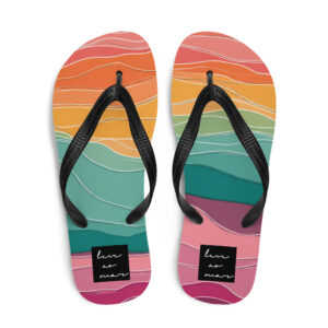 tropical flip flops with colorful sunset pattern in coral, yellow and teal tones